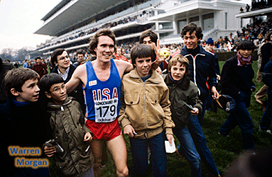 The kids surround the happy winner